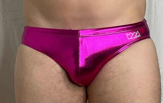 Vibrant magenta metallic swim brief with subtle white crown logo on waistband made for stylish swimming
