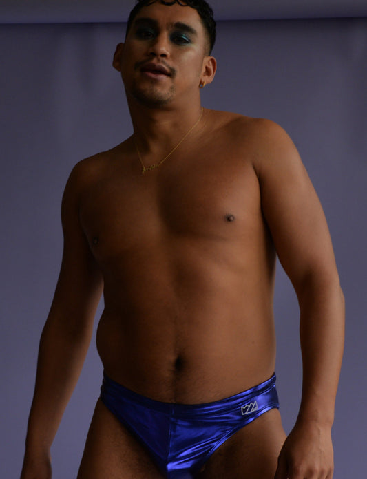 Shiny royal blue metallic swim brief with a small white logo on the left hip for stylish swimwear