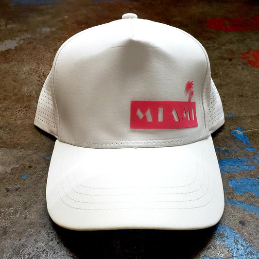White trucker miami baseball cap with red rectangular patch and palm tree silhouette for casual wear