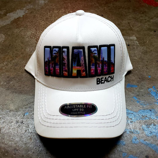 White baseball cap with vibrant colorful miami beach patch and urban skyline design with black trim