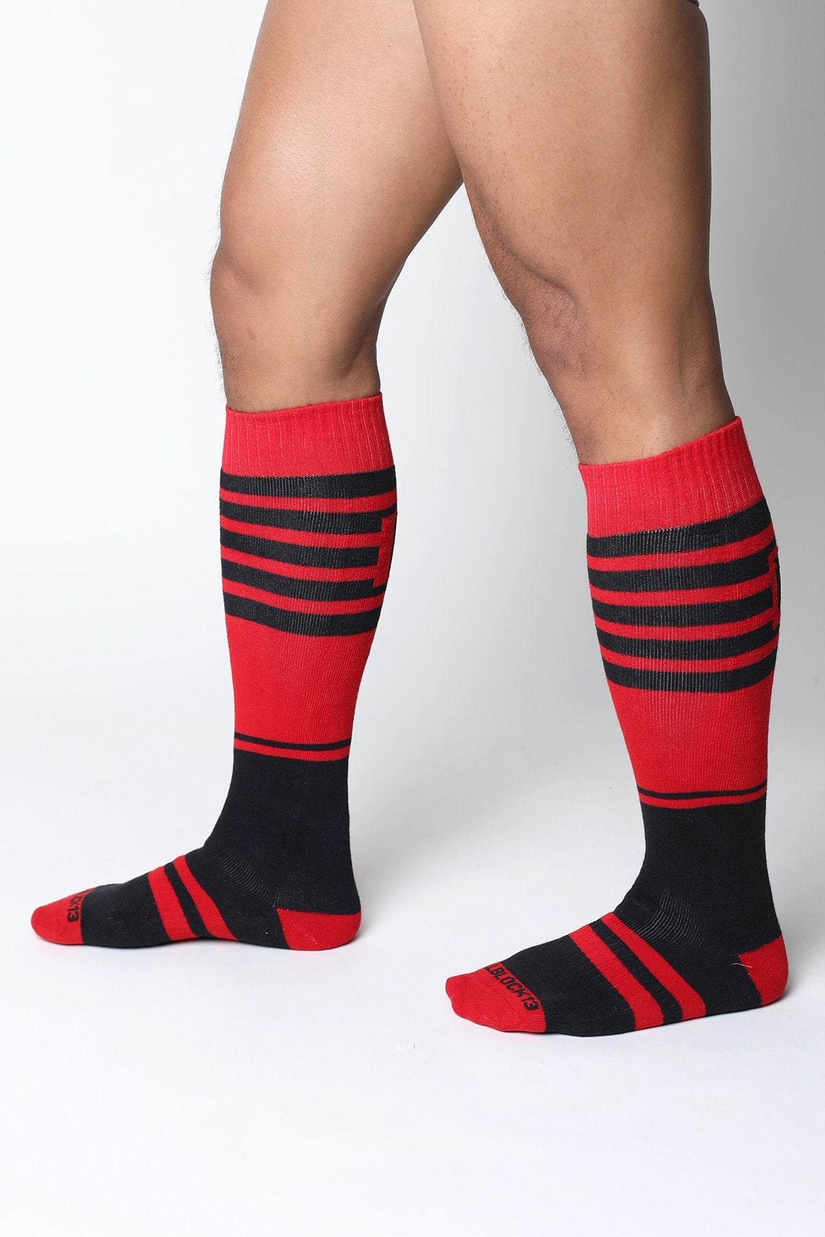 Midfield knee high socks in red and black stripes with ribbed texture for comfortable all day wear