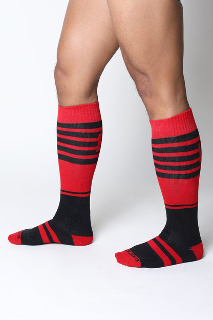 Midfield knee high socks in red and black stripes with ribbed texture for comfortable all day wear