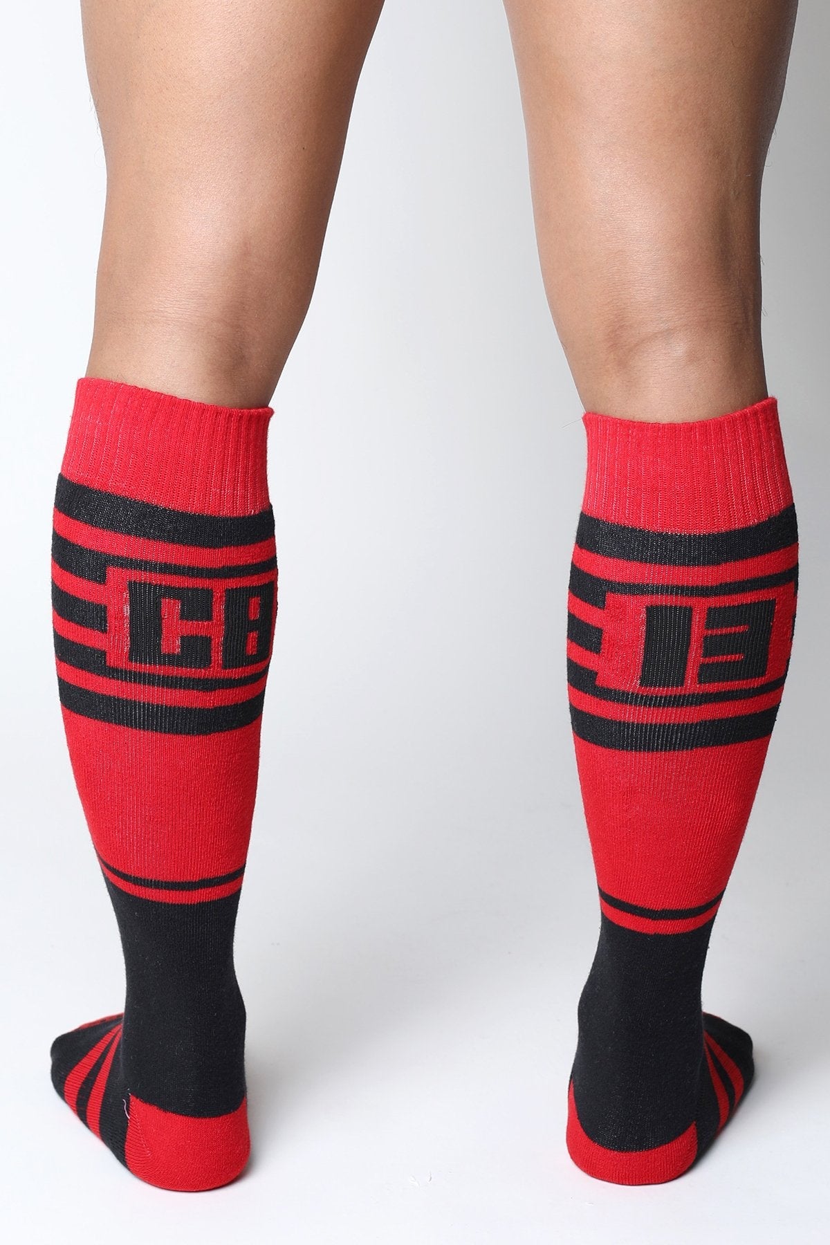 Midfield knee high socks in red and black with bold stripes and a cb logo on the calf in 7 colors