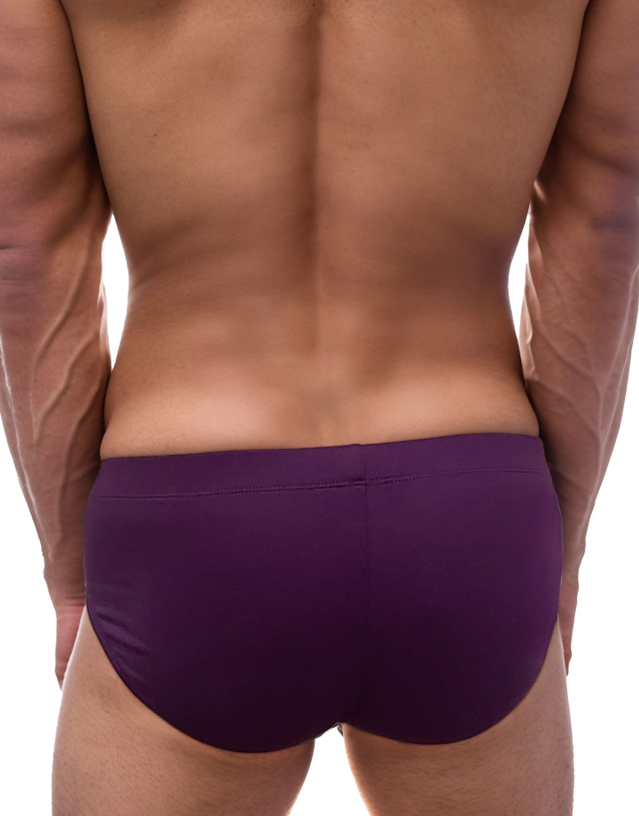 Back view of a man wearing solid purple modal briefs with a smooth, fitted cut.