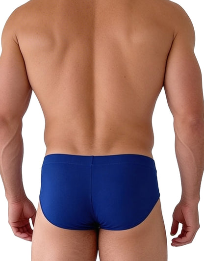 Back view of a muscular man wearing solid royal blue Big Boy Pouch modal brief underwear.