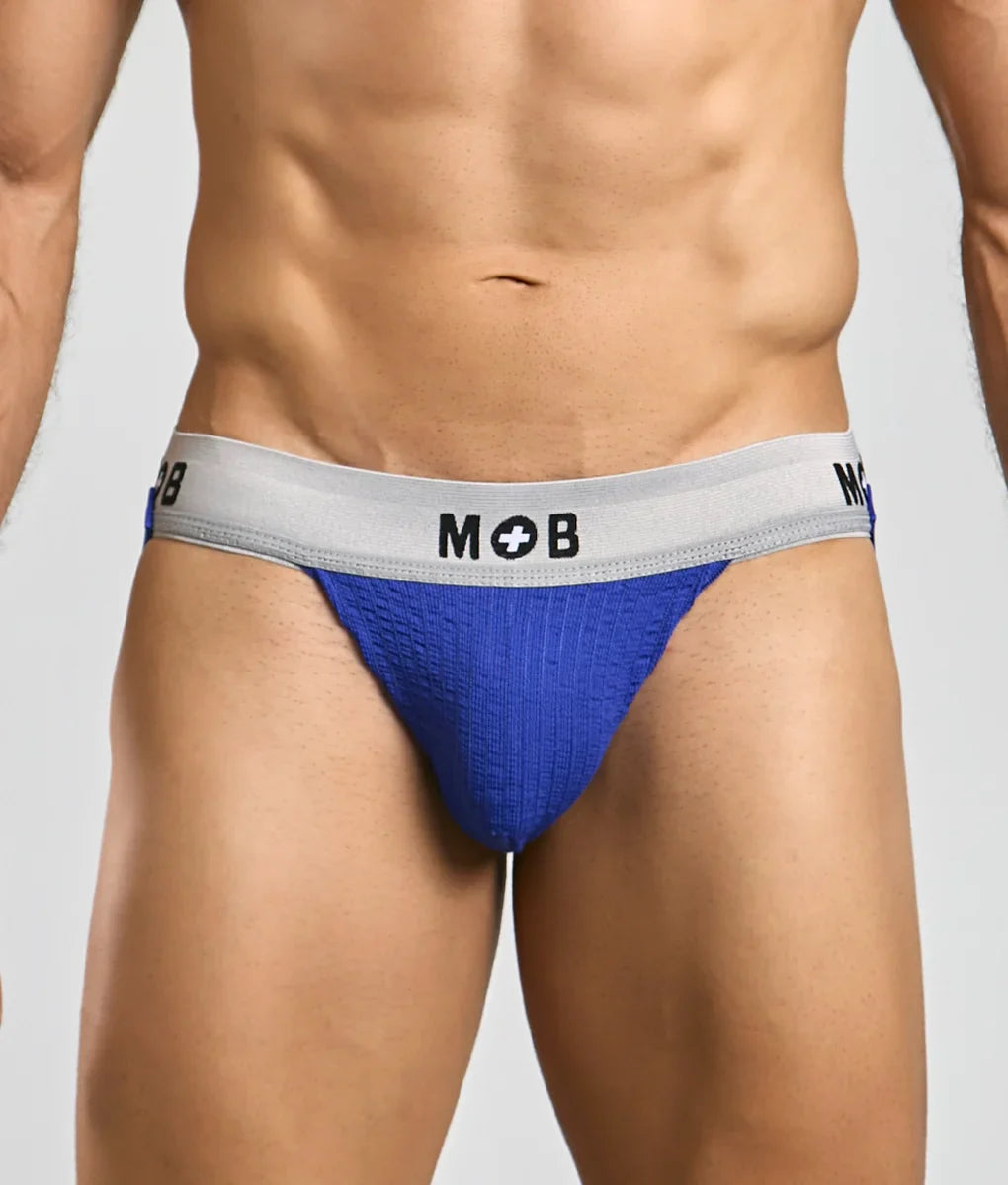 Blue textured briefs with a gray waistband featuring the mob logo from the mob classic jock 3 inches collection