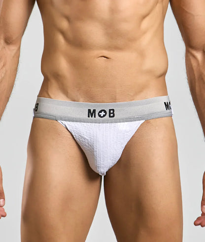 White textured briefs with a gray waistband featuring the mob logo from mob classic jock 3 inches collection