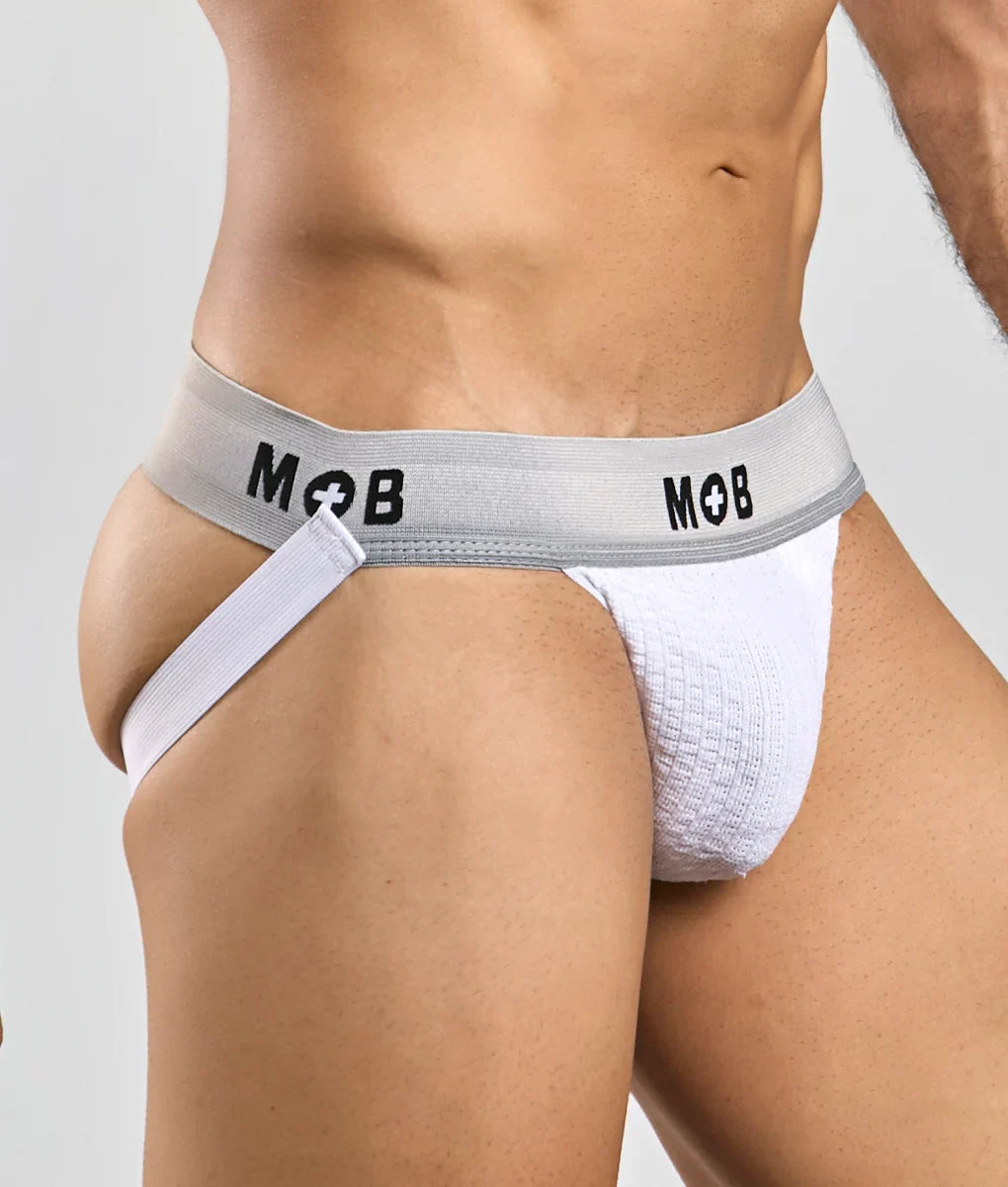 White textured jockstrap with gray elastic waistband and black mob branding for active support and comfort