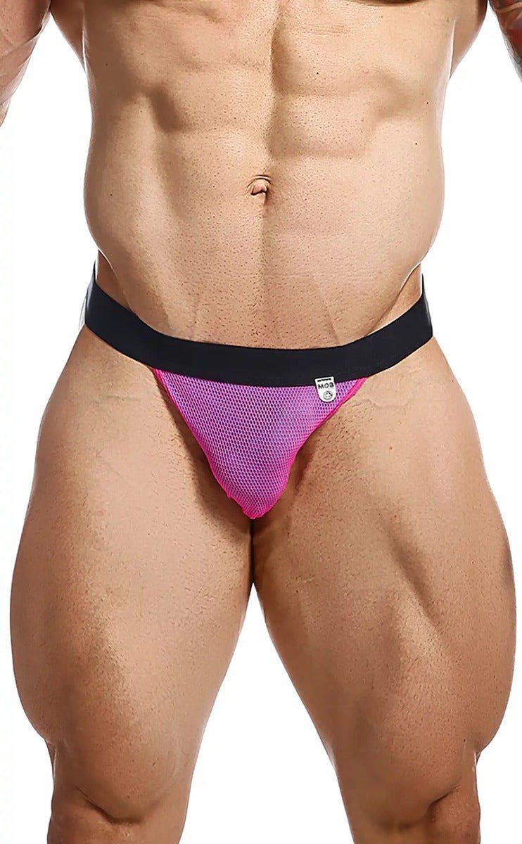 Vibrant pink mesh briefs with a black elastic waistband from mob fisherman jock final sale product line