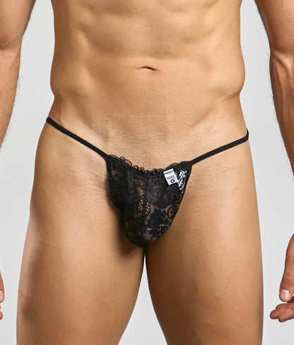 Black lace thong with thin elastic straps and small white brand tag from mob mens lace thong collection