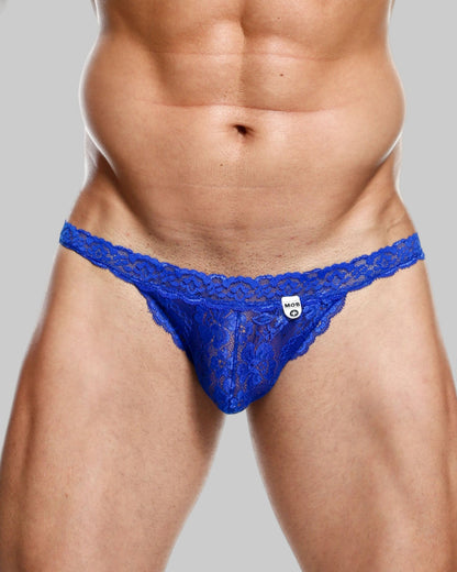Blue lace thong with intricate pattern and small white brand tag from MOB mens lace waist thong collection