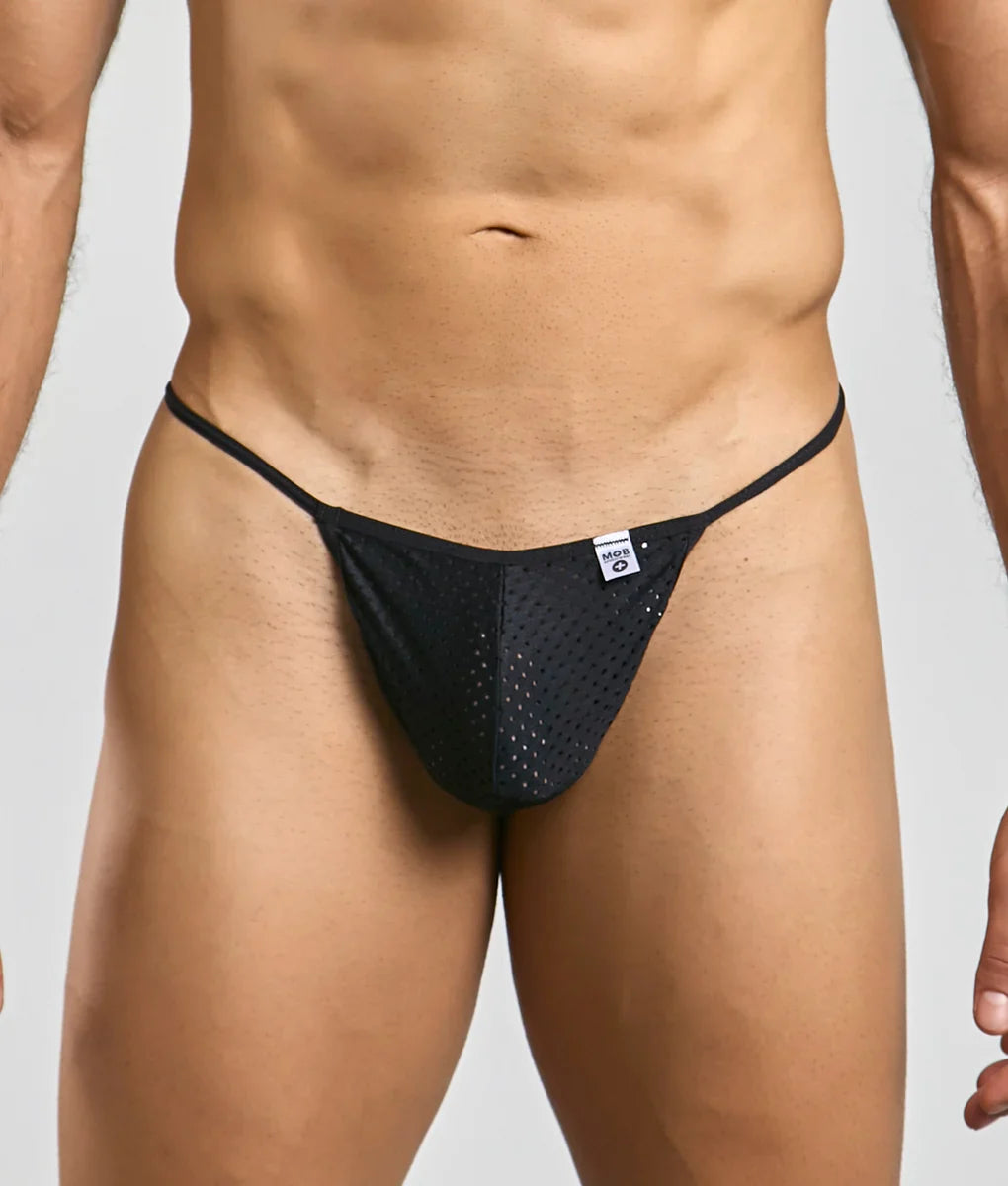 Black mesh thong with thin elastic waistband and small white mob brand tag made of microfiber for men