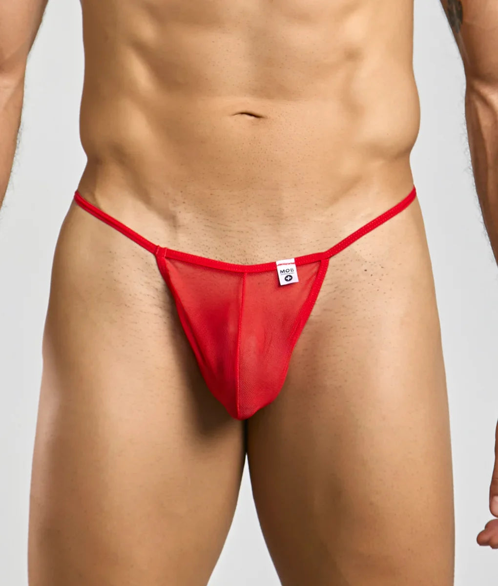 MOB men’s sheer t back thong in red sheer mesh with thin elastic waistband and small white brand tag shown from the back