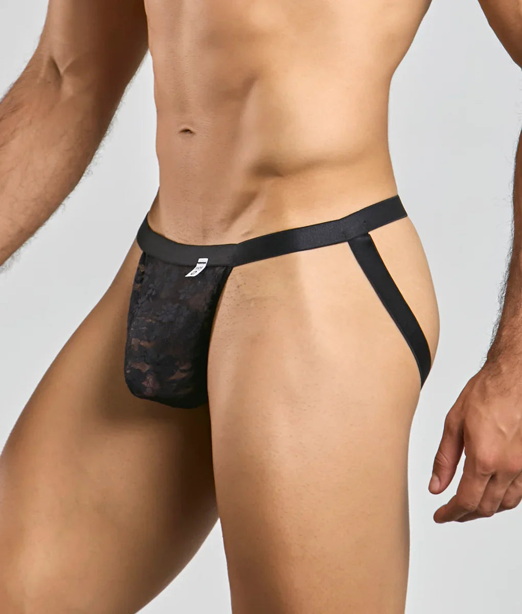 Black lace thong with solid black waistband and side straps featuring mesh in a mob sexy mesh and lace jockstrap