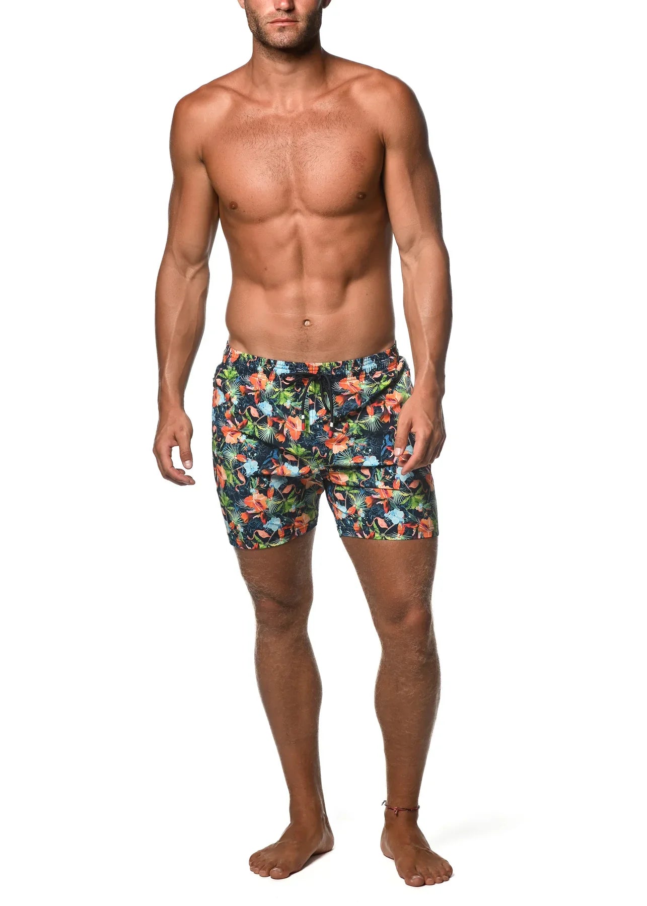 Men’s Moritz 6 inch inseam swim shorts with vibrant orange blue and green tropical floral print on dark navy base