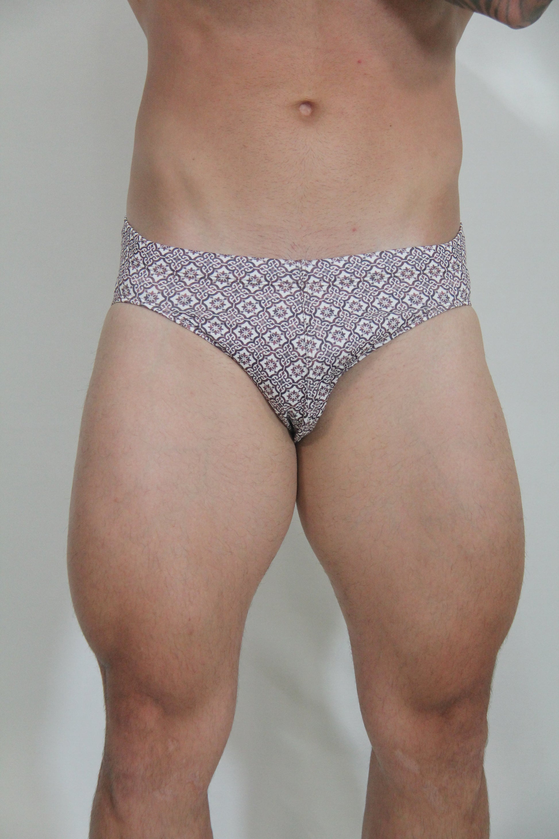 Black and white geometric patterned MOSAICO swim brief designed for stylish swimwear use