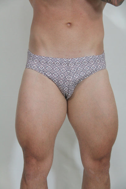 Black and white geometric patterned MOSAICO swim brief designed for stylish swimwear use