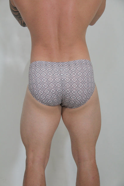 Gray and white patterned geometric mosaic swim brief with a comfortable fit for swimming and beachwear
