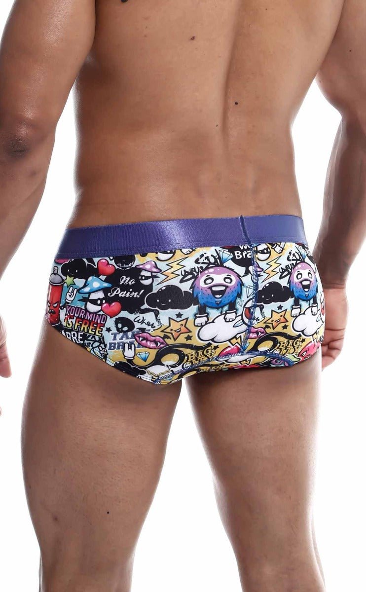 Malebasics hipster brief comics vibrant cartoon swim trunks with purple waistband and multicolored graphics on yellow base