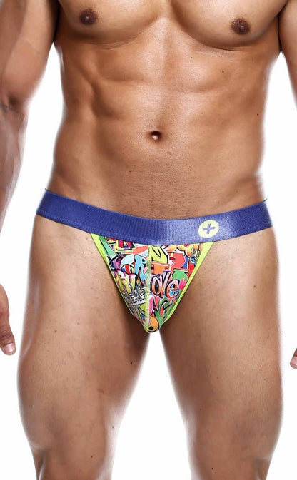 Malebasics hipster thong comics featuring vibrant graffiti-style print with bold blue waistband and neon green trim