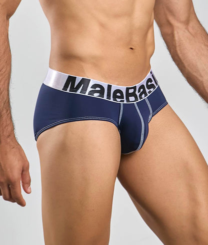 Navy blue malebasics microfiber brief with white elastic waistband black lettering and gray stitching along seams back side
