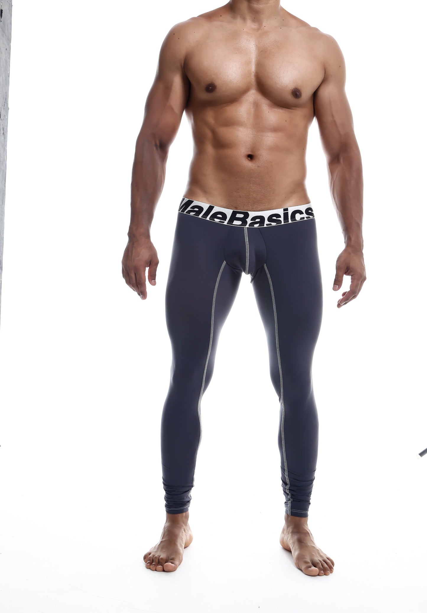 Dark navy blue malebasics microfiber compression tights with white elastic waistband and gray seam stitching