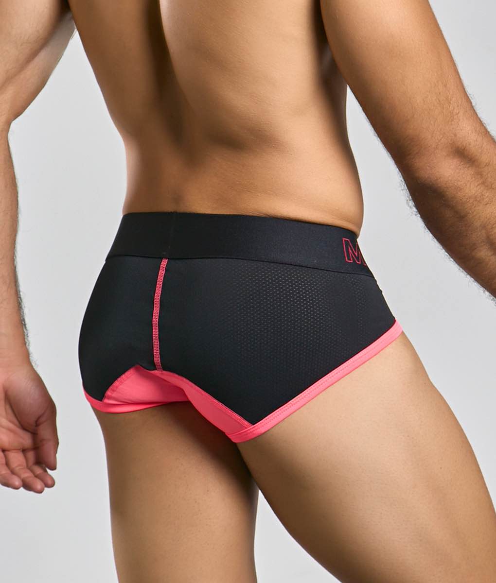 MaleBasics neon brief black athletic briefs with vibrant pink trim mesh detailing and subtle brand logo on waistband