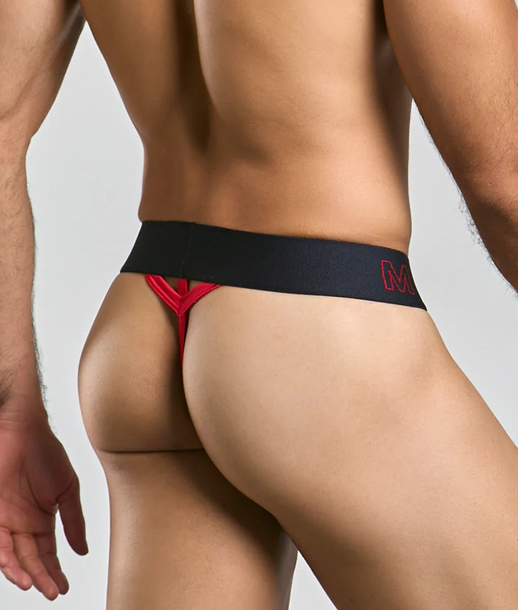 Malebasics neon thong showing black and red bold contrasting design for men’s underwear with neon accents