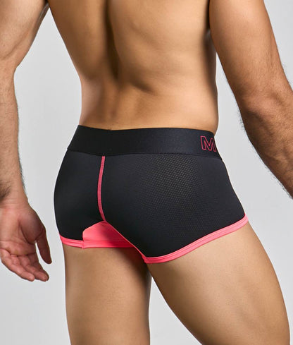 Malebasics neon trunk black athletic briefs with vibrant pink trim mesh detailing and subtle m logo on waistband