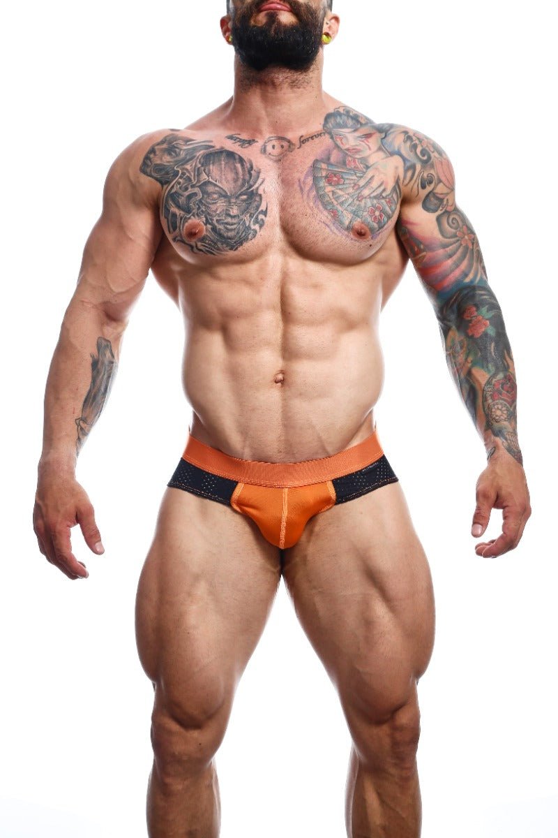 Orange and black male basics spot brief with perforated waistband made for athletic support