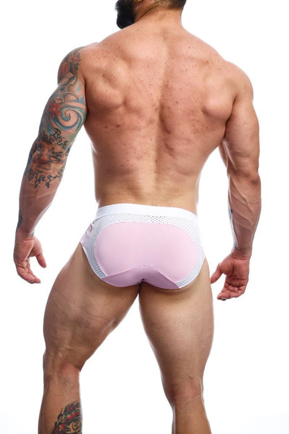 Pink mesh male basics spot brief with white trim showing front side for comfortable daily wear