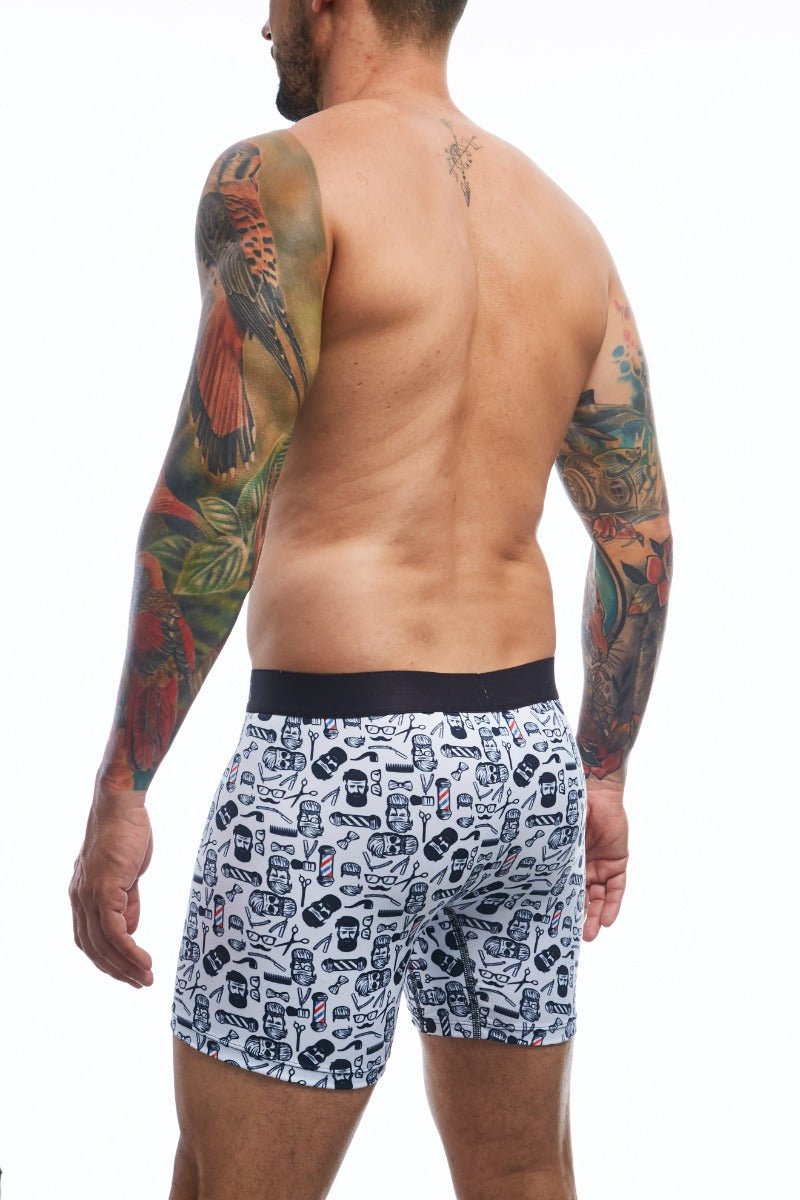 White malebasics boxerbrief with black waistband and barbershop skulls glasses and razors pattern