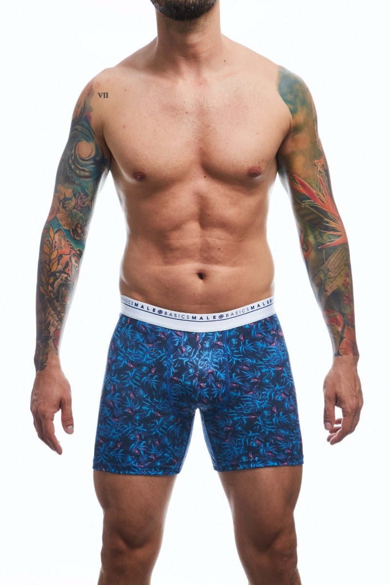 Blue patterned men’s boxer briefs with flamingos and a white male basics waistband for comfortable everyday wear