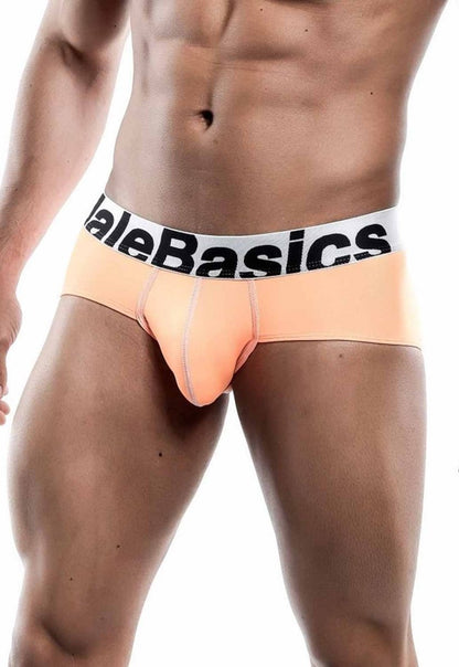Peach male briefs with white malebasics logo waistband designed for sports performance hip support