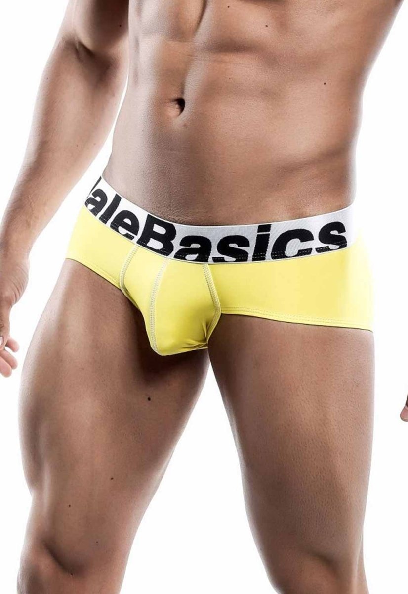 Malebasics men’s sports performance hip brief in bright yellow with white elastic waistband and bold black brand name