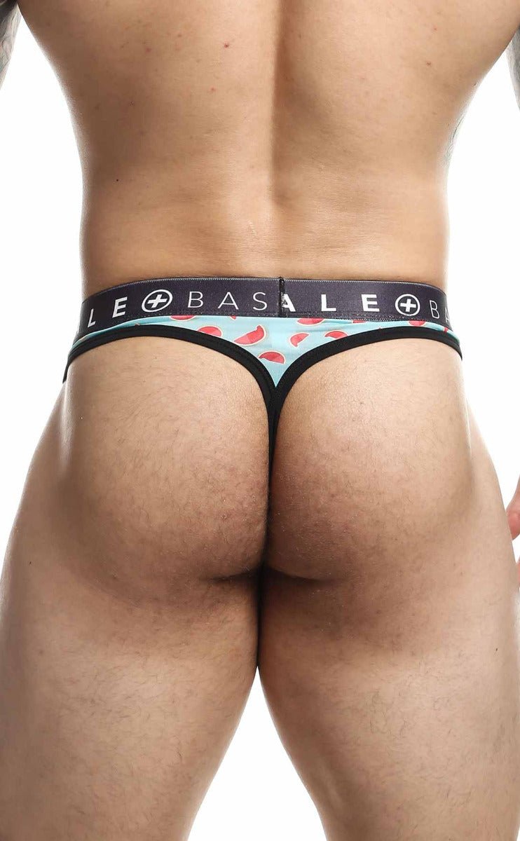 Malebasics mens thong with red chili pepper pattern light blue fabric and black elastic waistband featuring le basale branding