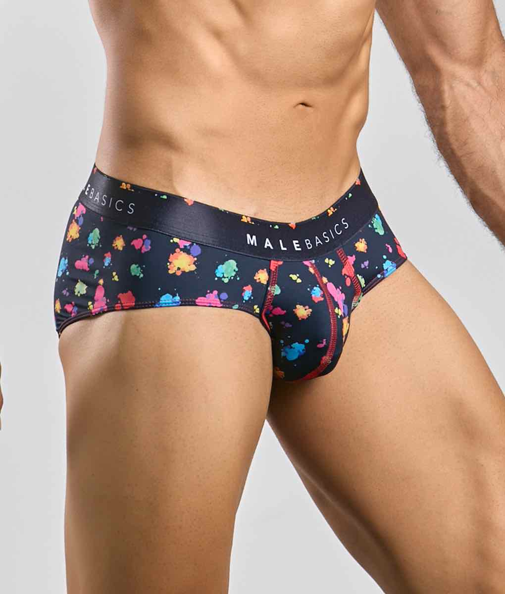 Black men’s hipster briefs with vibrant multicolored paint splatter pattern and Malebasics branded waistband