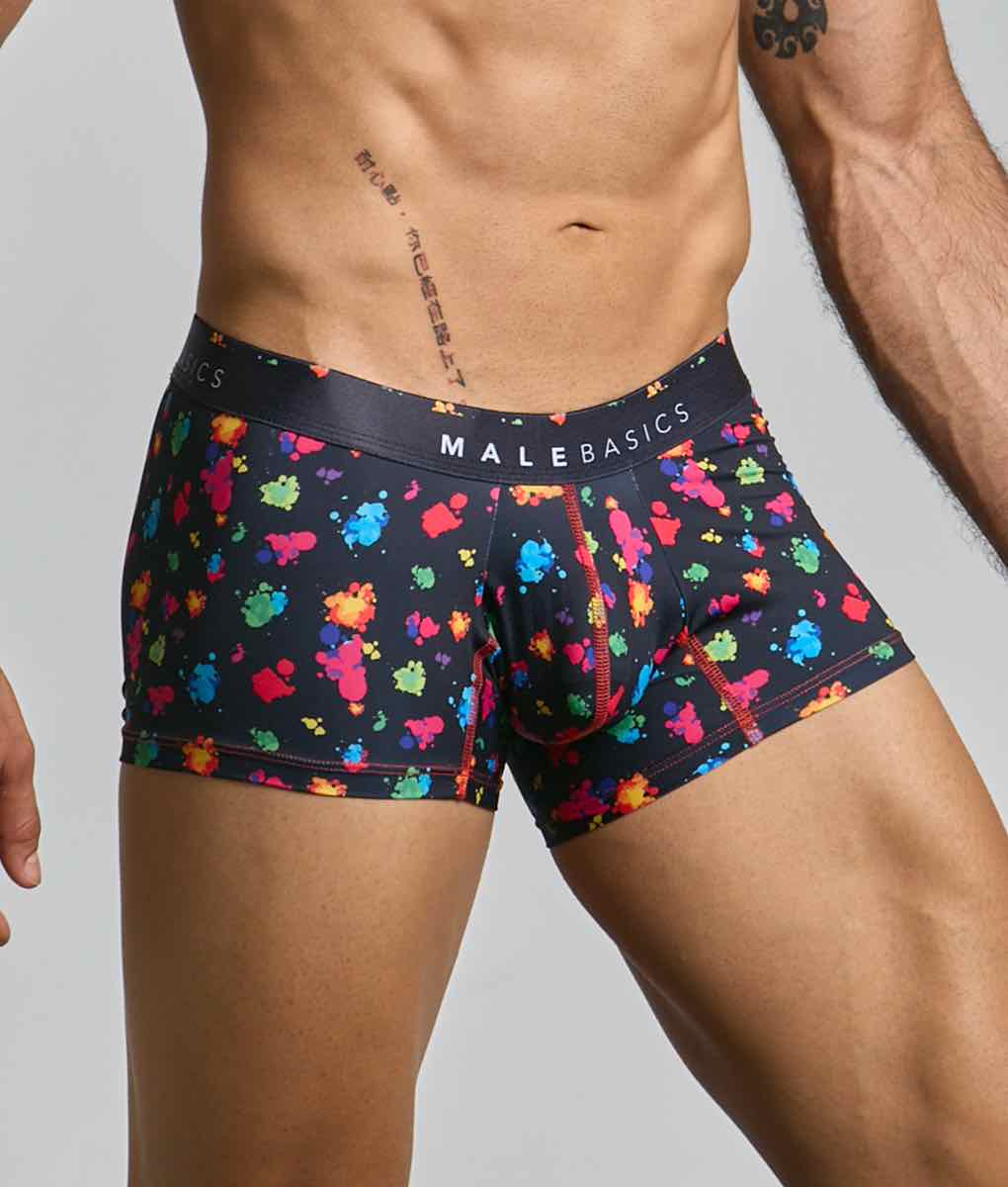 Black men’s boxer briefs with vibrant multicolored paint splatter design and malebasics branded waistband