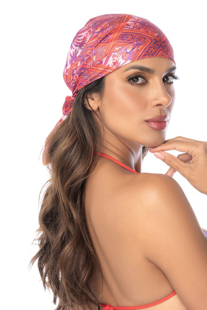 Mapale 47018 all ways scarf in desert mirage features a vibrant pink and purple geometric patterned headscarf wrapped snugly