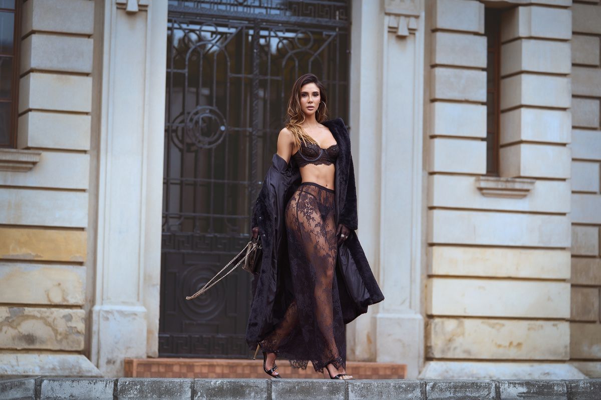 Mapale black three-piece lingerie set featuring a lace bra, matching briefs, and a sheer lace skirt.