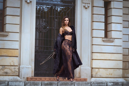 Mapale black three-piece lingerie set featuring a lace bra, matching briefs, and a sheer lace skirt.