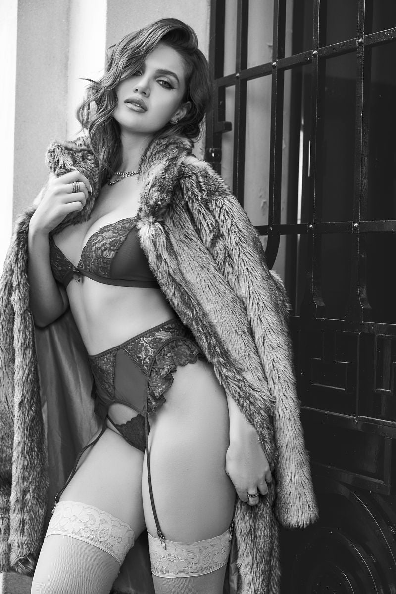 Mapale three-piece lingerie set with lace bra, garter belt, and matching panties, worn under a fur coat.
