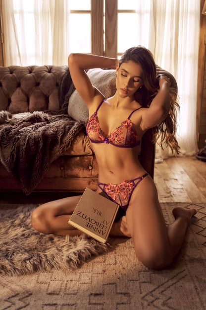 Mapale two-piece purple lingerie set with sheer cups and thong, featuring orange and pink floral embroidery.