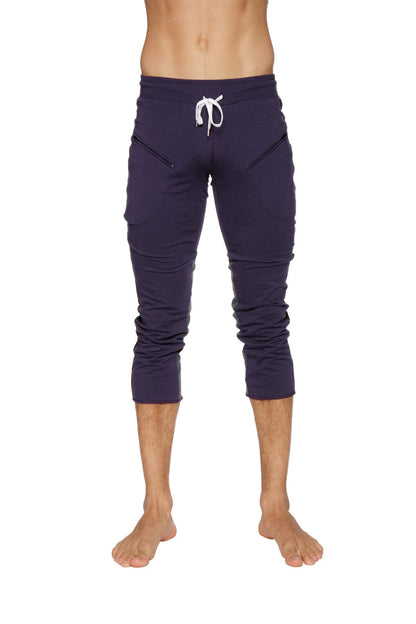Mens navy blue capri athletic pants with white drawstring waistband and side pockets for yoga and casual wear