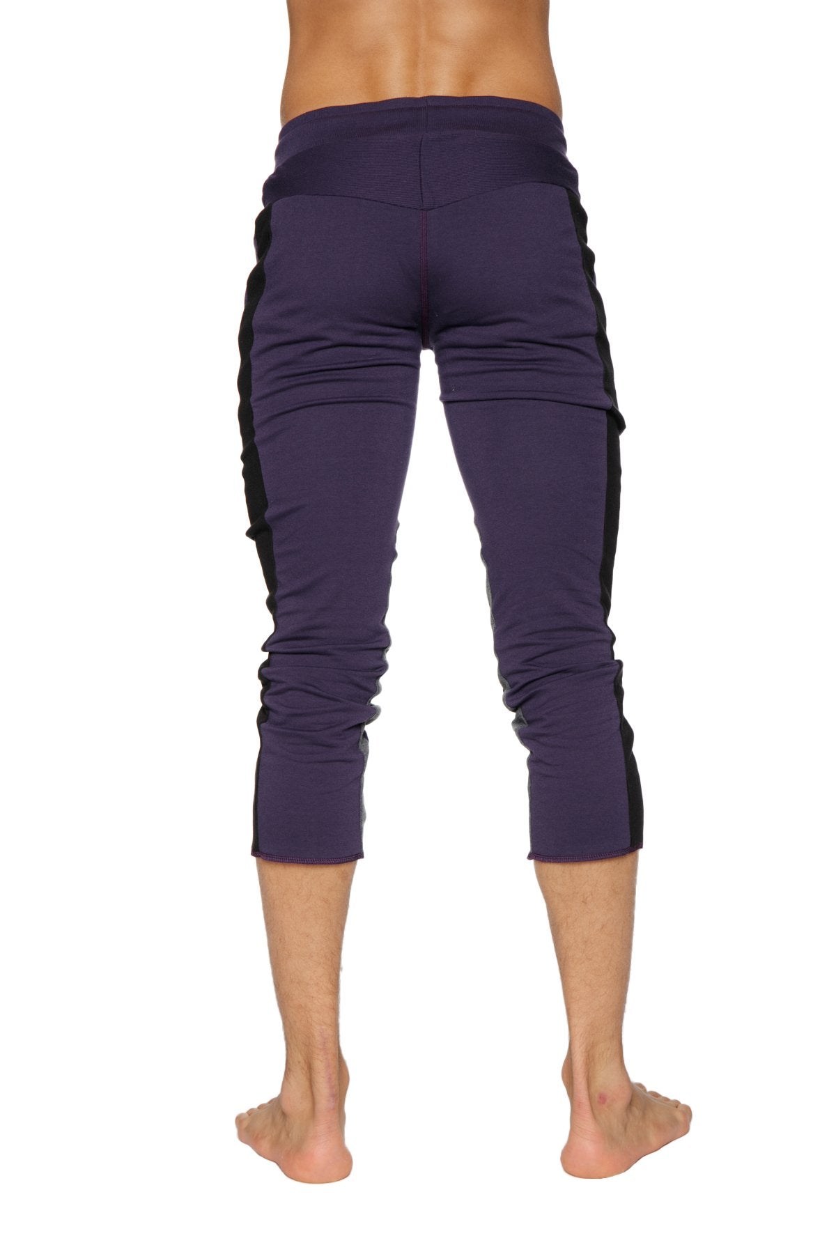 Mens eggplant capri yoga pants with black side panels and 45 zipper pocket for activewear use