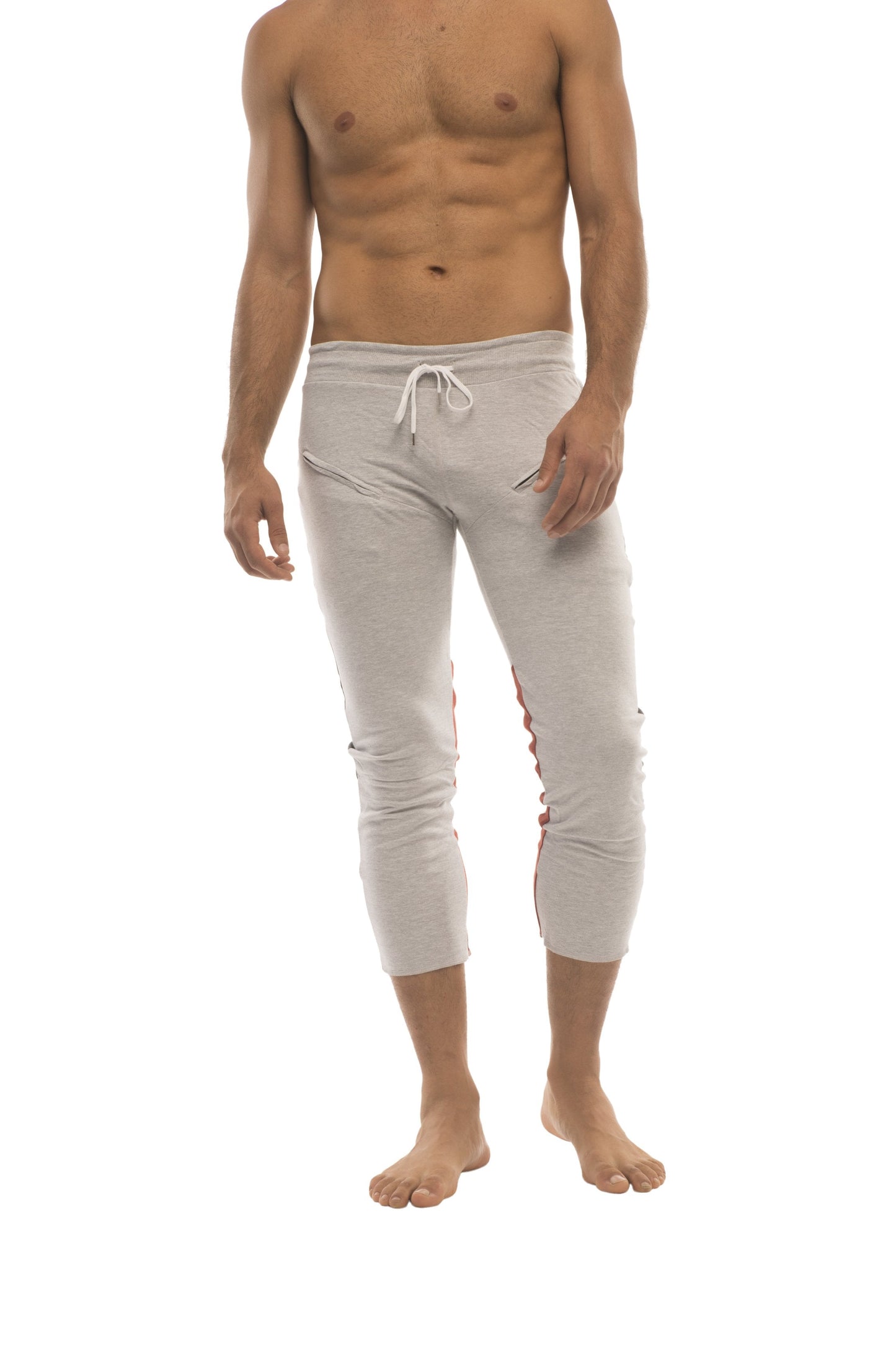 Light gray mens capri yoga pants with white drawstring waistband and red side stripes featuring 4 5 zipper pockets