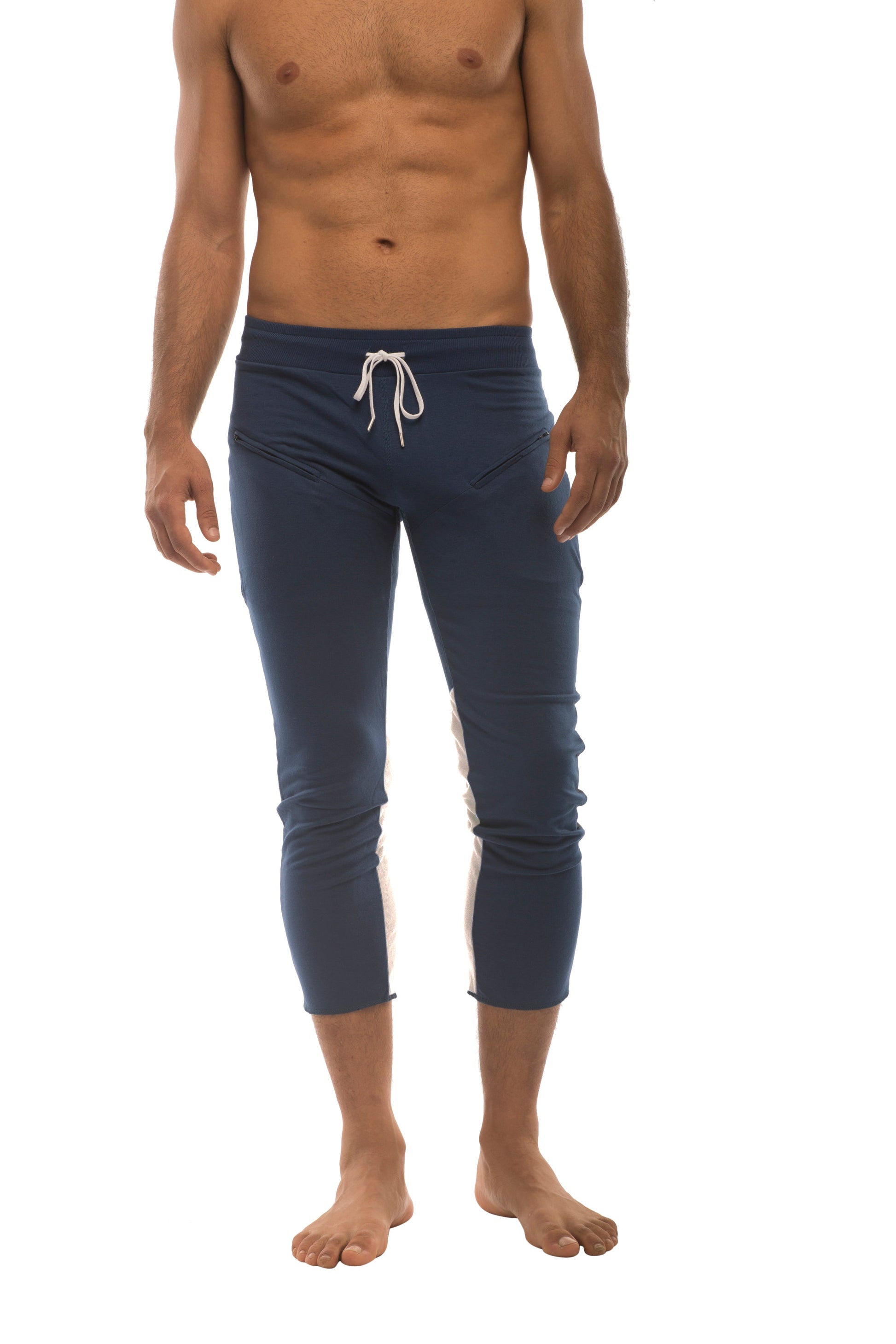 Navy blue mens 4/5 zipper pocket capri yoga pants with white drawstring and side stripes for athletic use