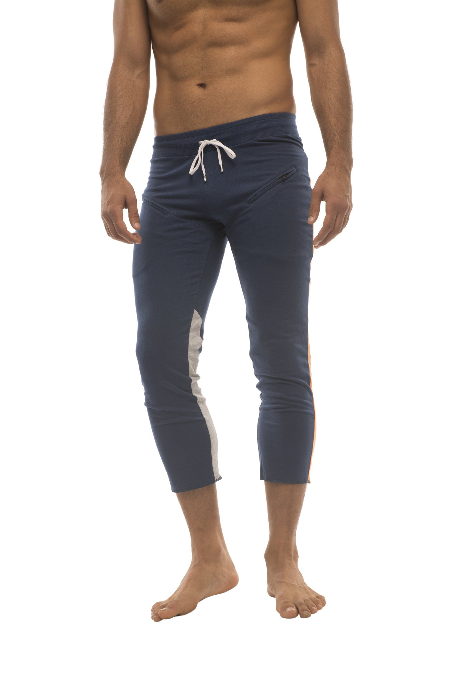 Mens navy blue capri yoga pants with white side stripes and matching drawstring waistband for athletic use
