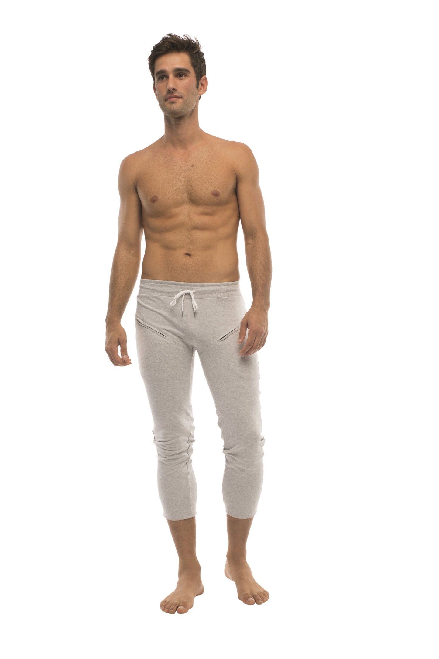 Mens solid heather grey capri yoga pants with drawstring waist and side pockets in light gray fabric