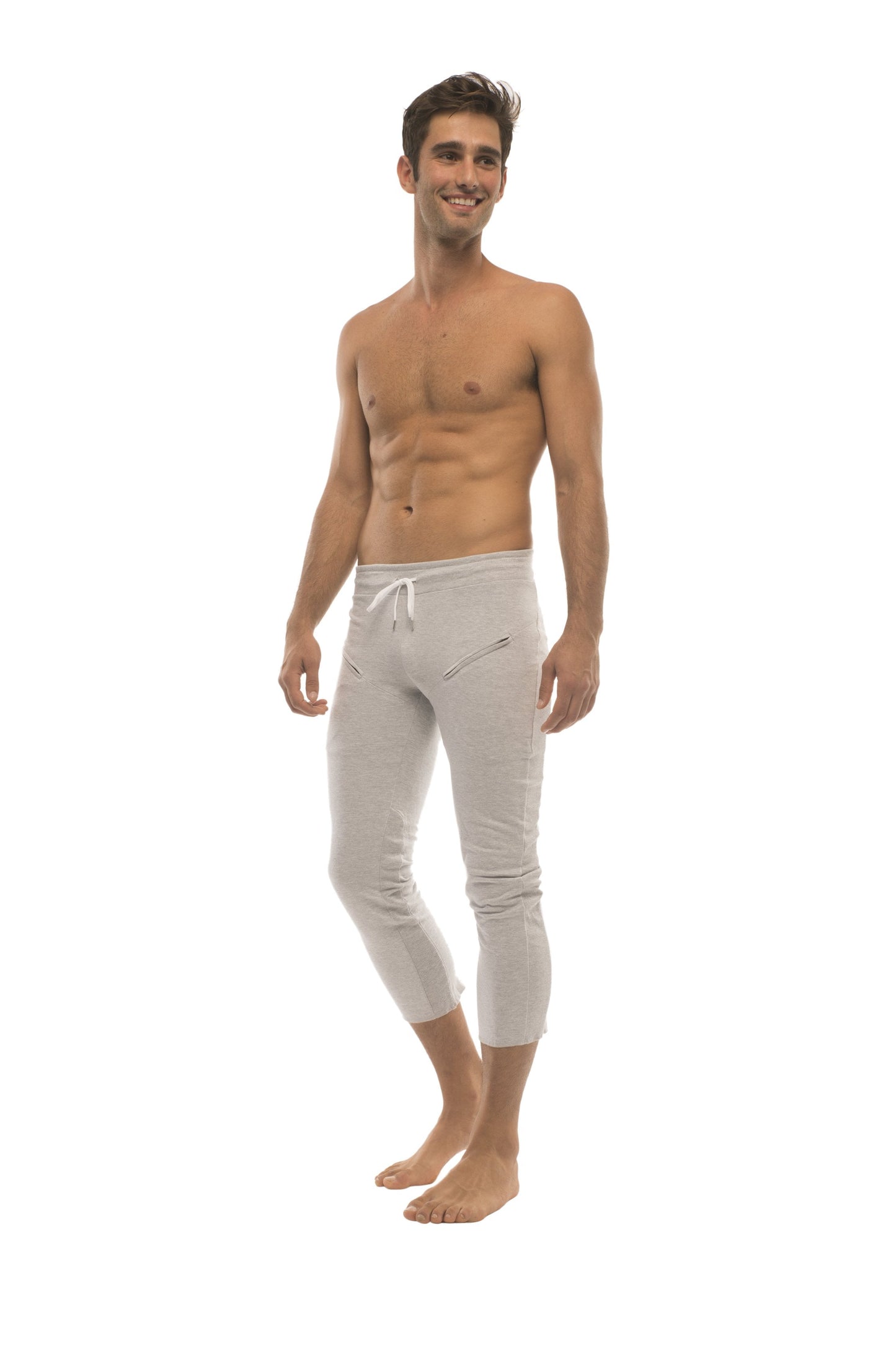 Mens 4/5 solid heather grey capri yoga pants with white cropped joggers featuring drawstring waist and zipper pockets